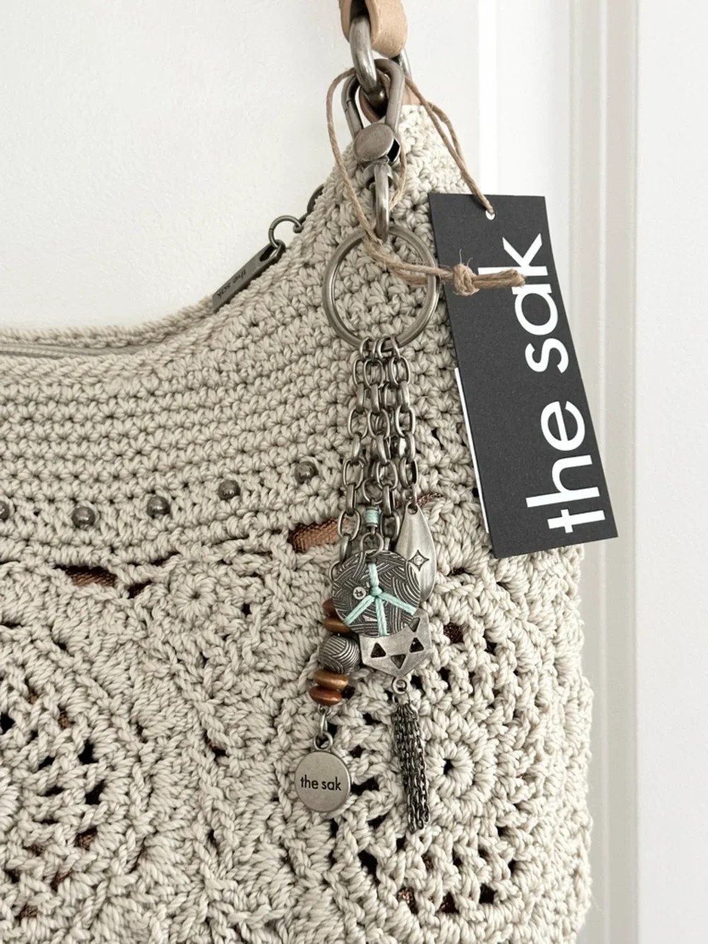 The Sak Sequoia Cream & Tan Crochet Leather Hobo Shoulder Bag with Bag Charm - Picture 10 of 17